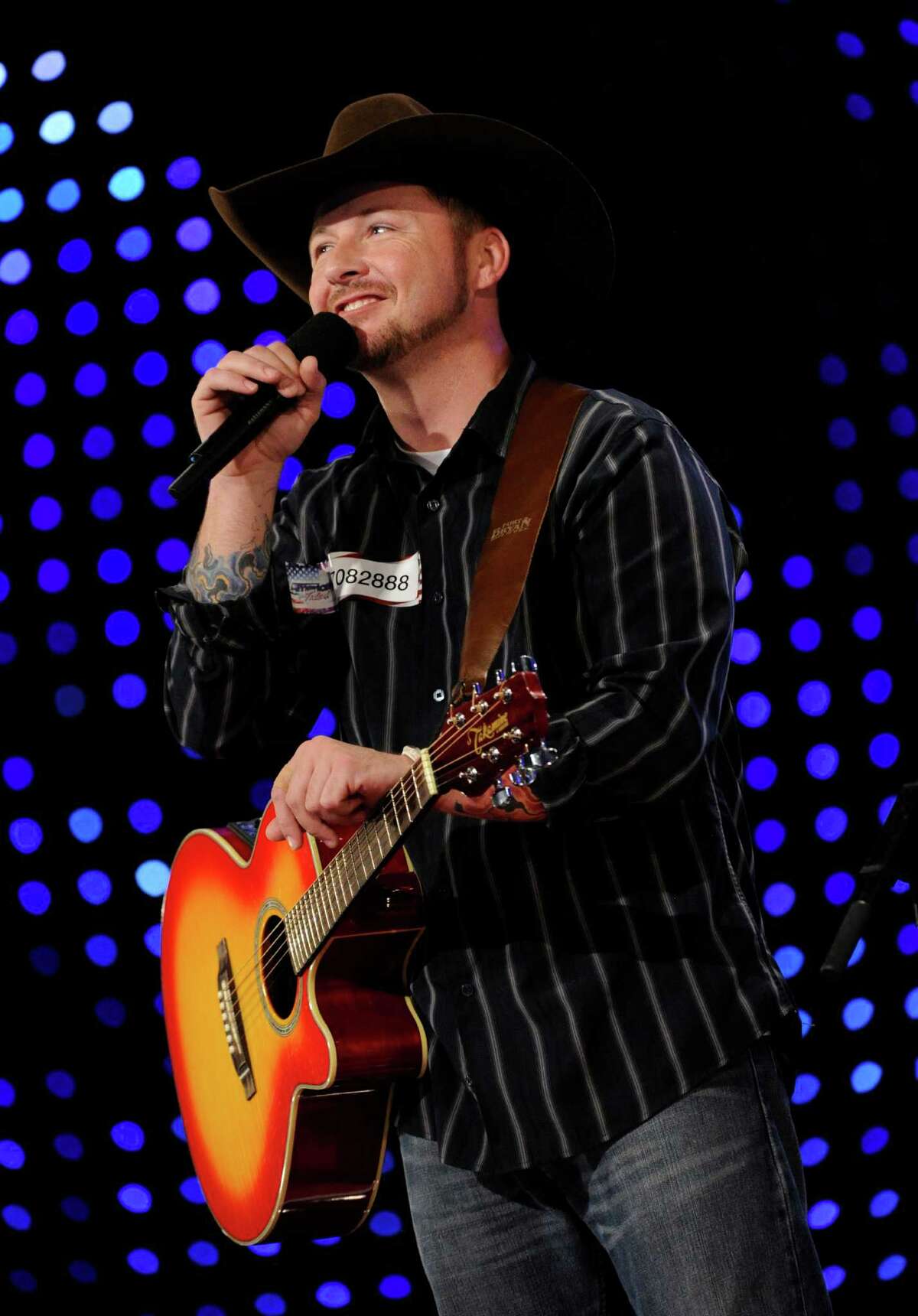 In this photo provided by NBCUniversal, Timothy Michael Poe appears on "America's Got Talent," on the episode that aired Monday, June 4, 2012. Poe, who claimed he was injured during a grenade blast in Afghanistan, has no military record of his purported combat injuries, the Minnesota National Guard said Tuesday, June 5, 2012.
