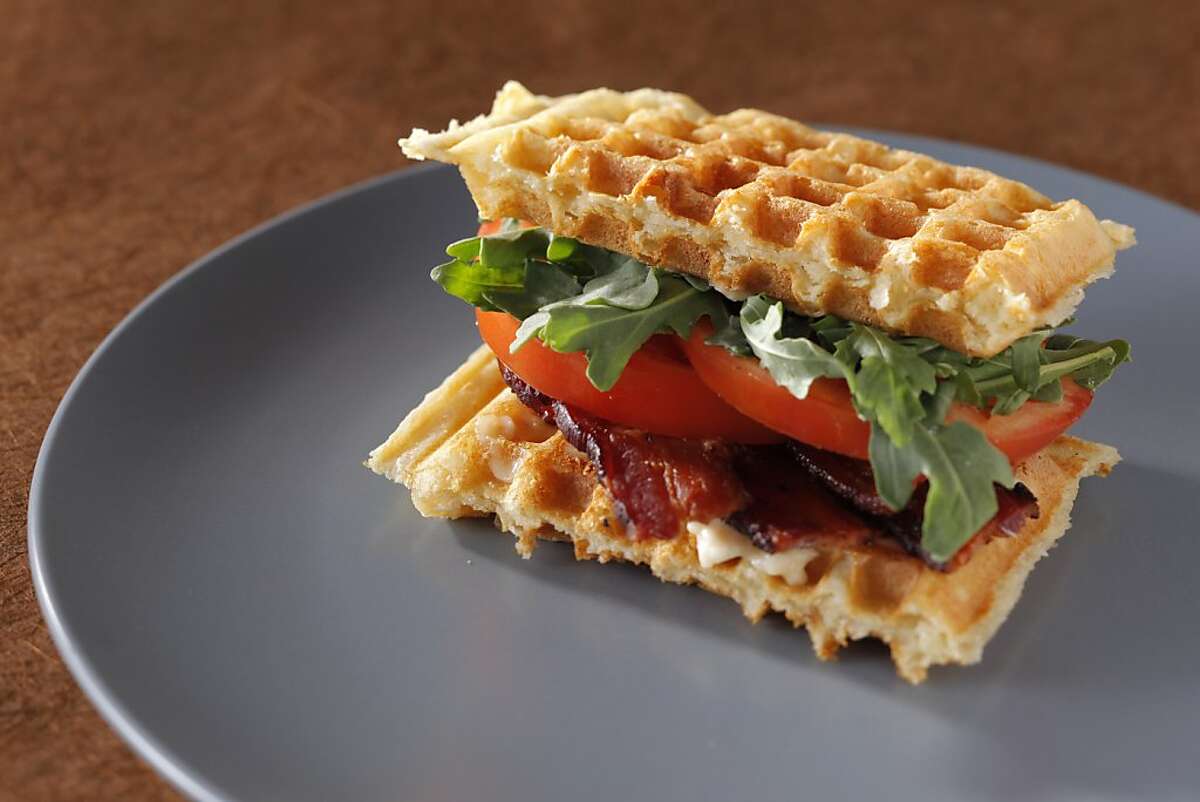 Waffles are a treat with syrup or as a sandwich