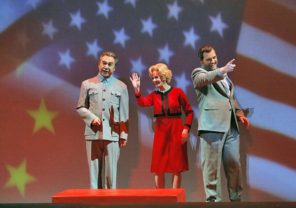 Chen-Ye Yuan (Chou En-lai), Maria Kanyova (Pat Nixon), and Brian Mulligan (Richard Nixon) in, "Nixon in China," by the San Francisco Opera.