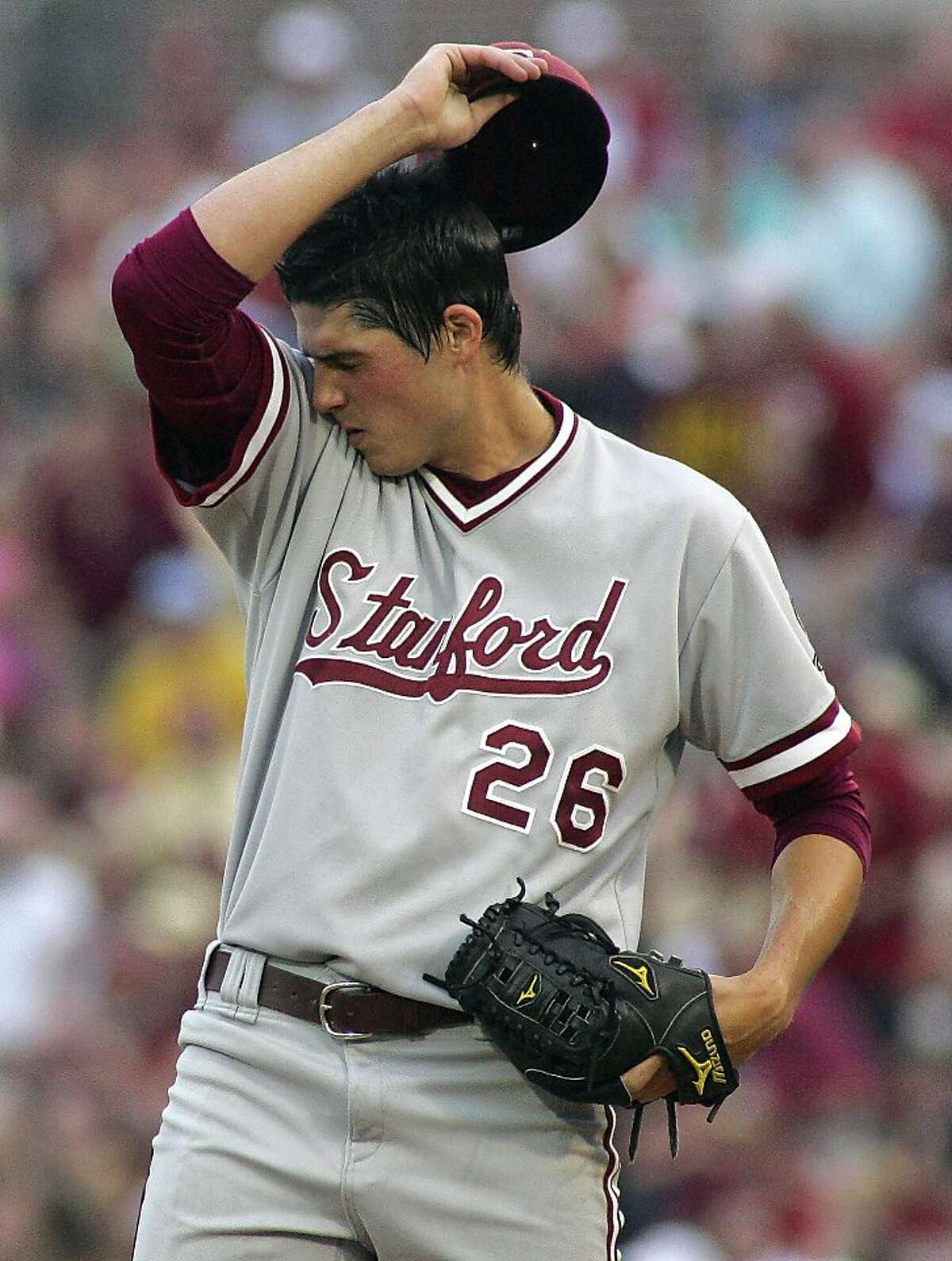 Stanford pitcher Mark Appel reacts in the fourth inning of an NCAA college baseball tournament super regional game against Florida State, Friday, June 8, 2012, in Tallahassee, Fla. (AP Photo/Phil Sears)
