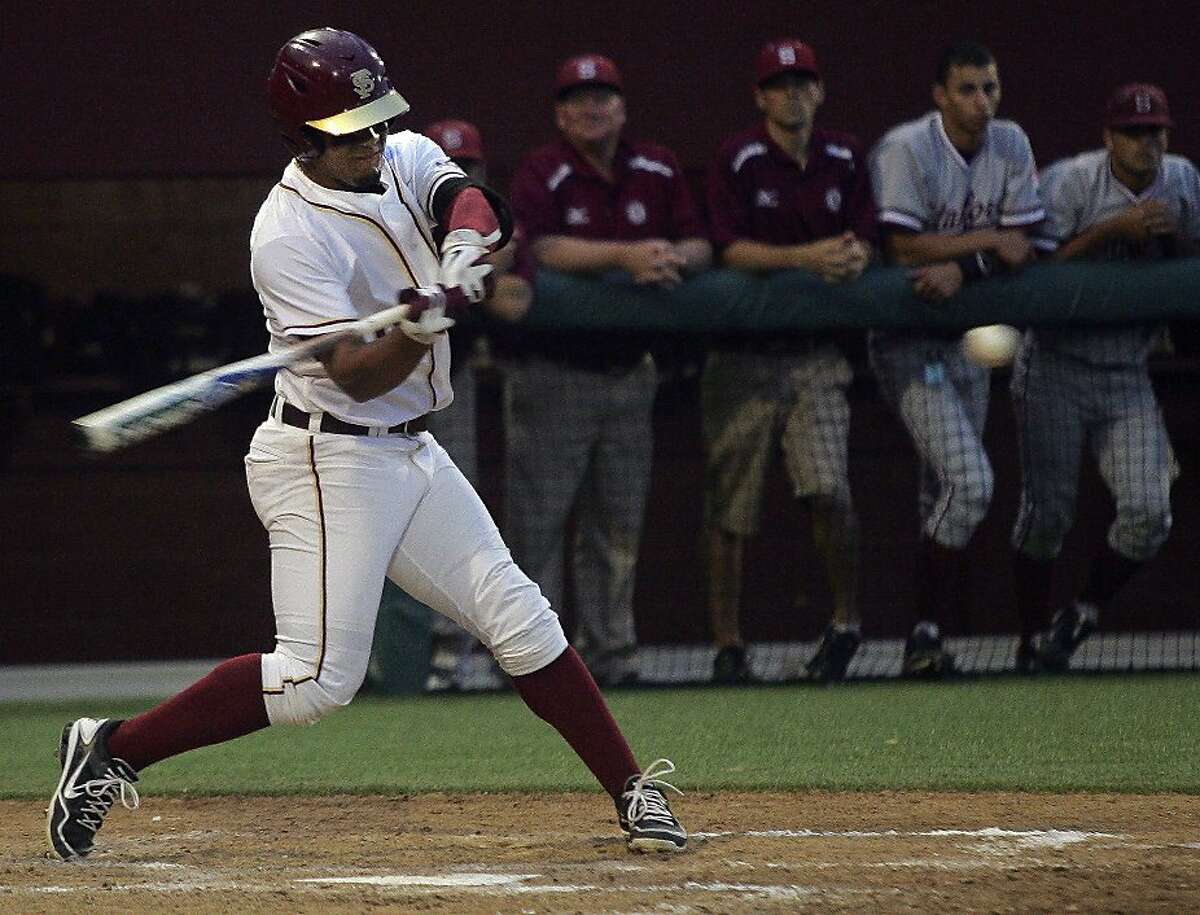 Florida State's Devon Travis (8) gets an RBI-single in the fourth inning of an NCAA college baseball tournament super regional game against Stanford, Friday, June 8, 2012, in Tallahassee, Fla. (AP Photo/Phil Sears)