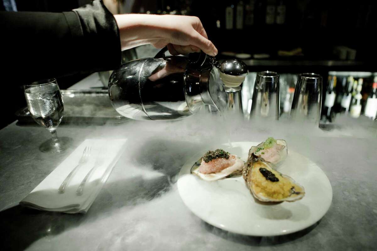 Oysters on the half-shell, including one with paddlefish caviar, an affordable substitute to sturgeon eggs, are served at Restaurant Stella in New Orleans.
