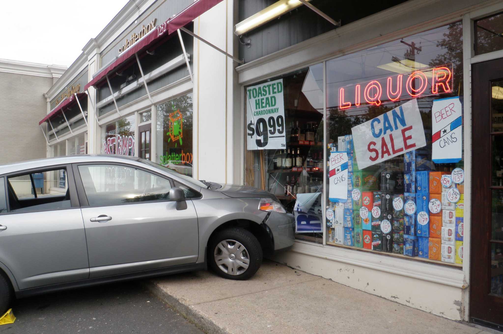Car crashes into front of liquor store