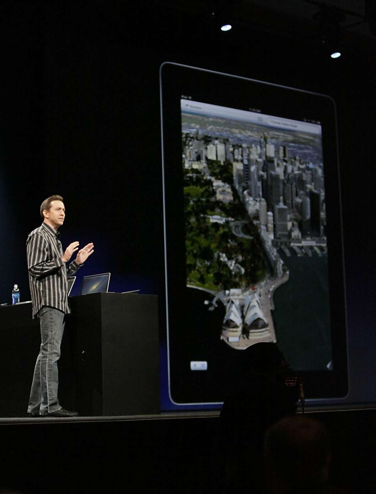 Apple Senior VP of iPhone Software Scott Forstall demonstrates Flyover, part of the new map application featured on iOS 6, during the keynote at the Worldwide Developers Conference 2012 at Moscone West on Monday, June 11, 2012 in San Francisco, Calif.