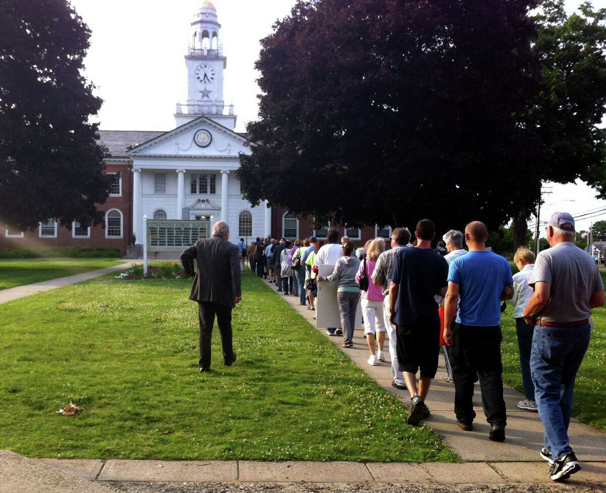 Dozens of supporters of the Shakespeare theater marched to Stratford Town Hall on Monday June 11, 2012 where they will present Mayor John A. Harkins and the Stratford Town Council with a petition of more than 1,000 signatures calling on the town to unlock the theater, renovate the White House and embrace the revitalization of the arts in Stratford, Conn..