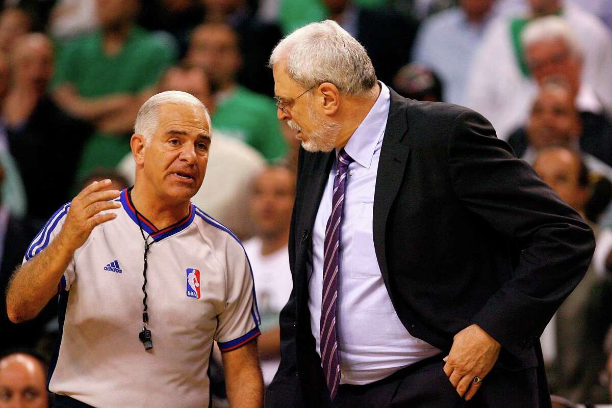 BOSTON - JUNE 17: Referee Bennett Salvatore explains a call to head coach Phil Jackson of the Los Angeles Lakers in the game against the Boston Celtics during Game Six of the 2008 NBA Finals on June 17, 2008 at TD Banknorth Garden in Boston, Massachusetts. The Celtics defeated the Lakers 131-92 to win the NBA Championship. NOTE TO USER: User expressly acknowledges and agrees that, by downloading and/or using this Photograph, user is consenting to the terms and conditions of the Getty Images License Agreement. (Photo by Jim Rogash/Getty Images)