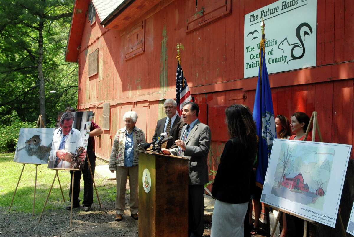 Mayor Michael Pavia announces the lease agreement between The City of Stamford (Conn.) and The Wildlife Center of Fairfield County for the Red Barn at Mianus River Park in Stamford on Monday June 11, 2012.