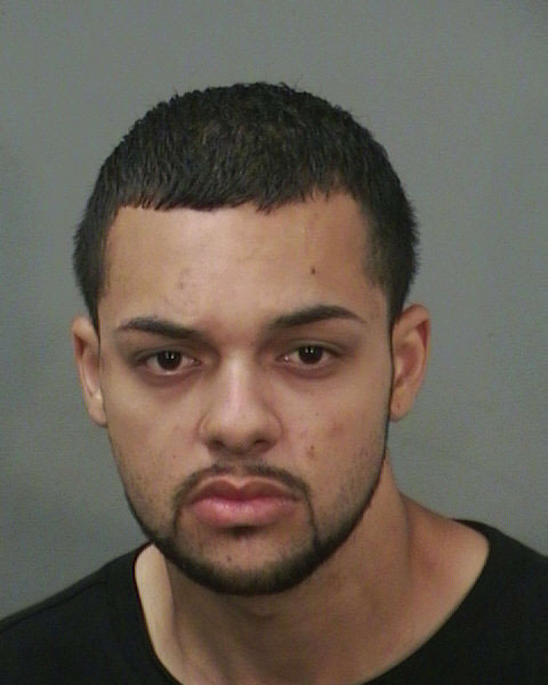 Man charged with murder after body found in U-Haul