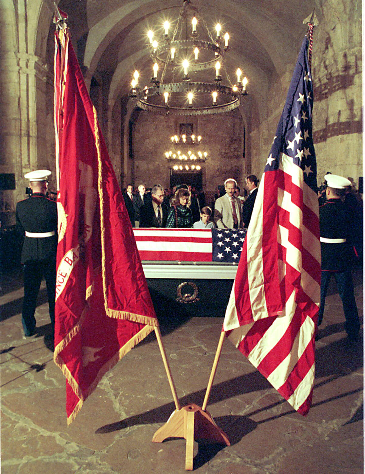 Family members pass Staff Sgt. William James Bordelon’s casket as he lies in repose at the Alamo in 1995. The next day, he was reinterred at Fort Sam Houston National Cemetery.