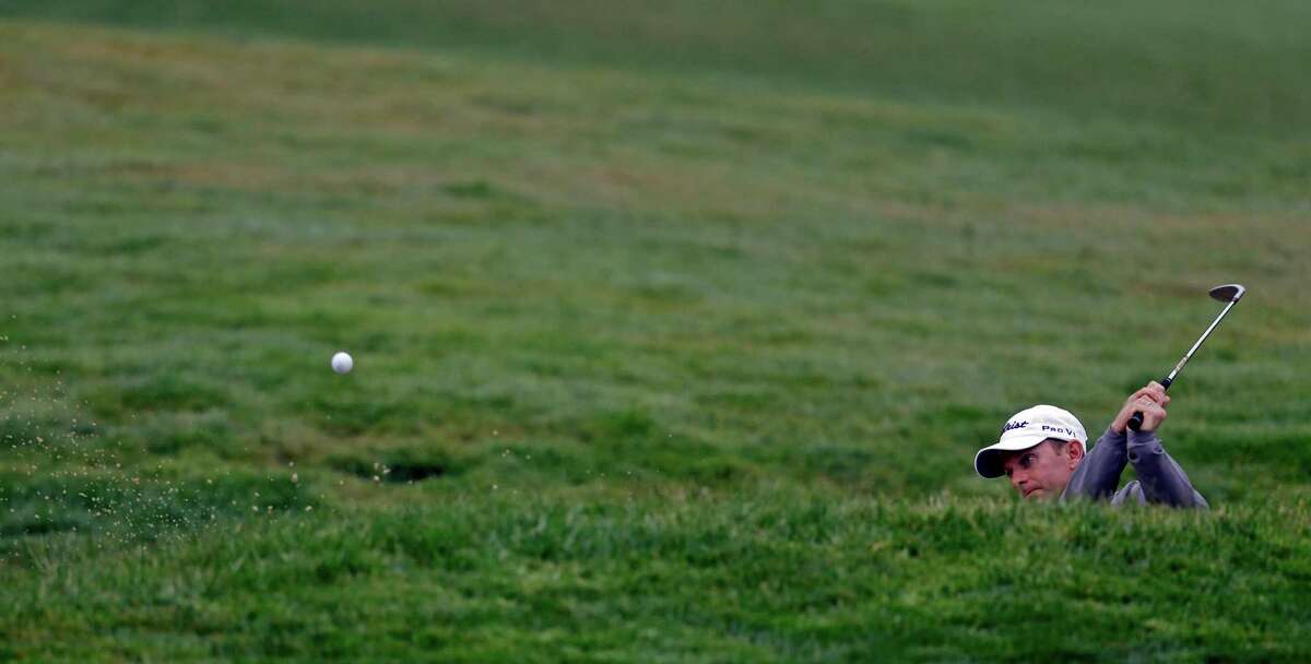 Brian Gaffney hits out of a bunker on the second hole during a practice round for the U.S. Open Championship golf tournament Wednesday, June 13, 2012, at The Olympic Club in San Francisco. (AP Photo/David J. Phillip)