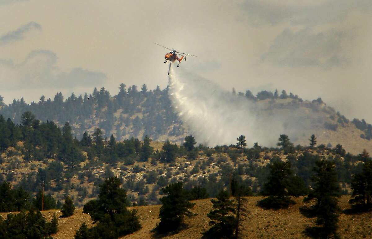 Wildfire smoke hits Denver as West blazes spread