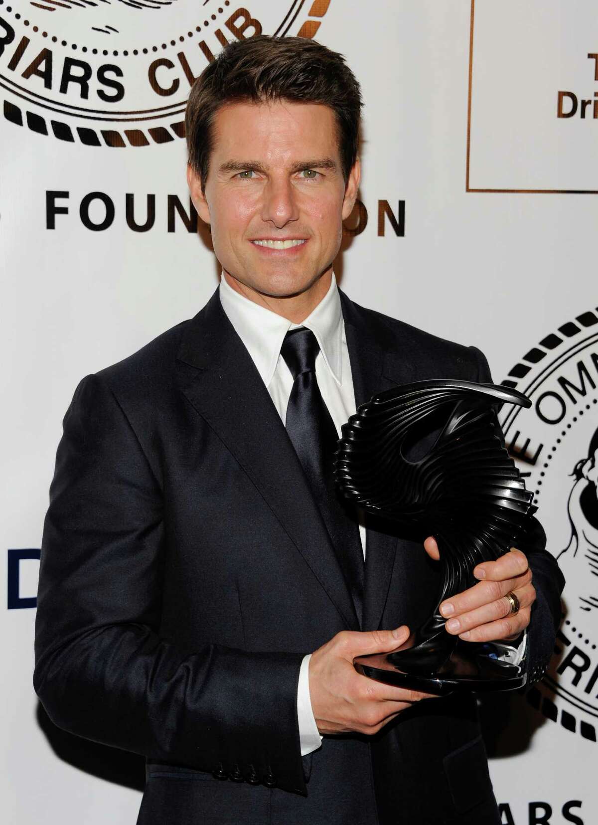 Actor Tom Cruise poses after being honored by The Friars Club and Friars Foundation at The Waldorf-Astoria on Tuesday June 12, 2012, in New York. (Photo by Evan Agostini/Invision/AP)