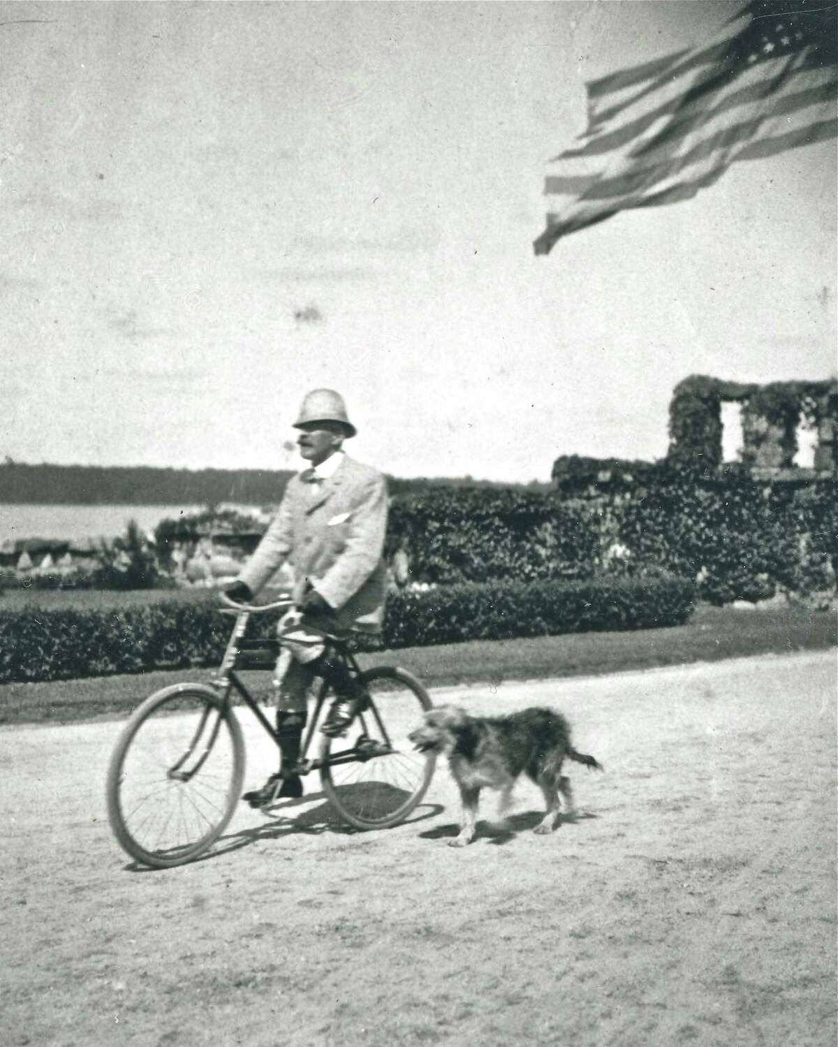 The Greenwich Historical Society will sponsor a "Greenwich Point History on Wheels" family bike tour on Sunday, June 24. In this vintage photograph, taken circa 1900, J. Kennedy Tod is seen bicycling around his estate - on what is today Greenwich Point.