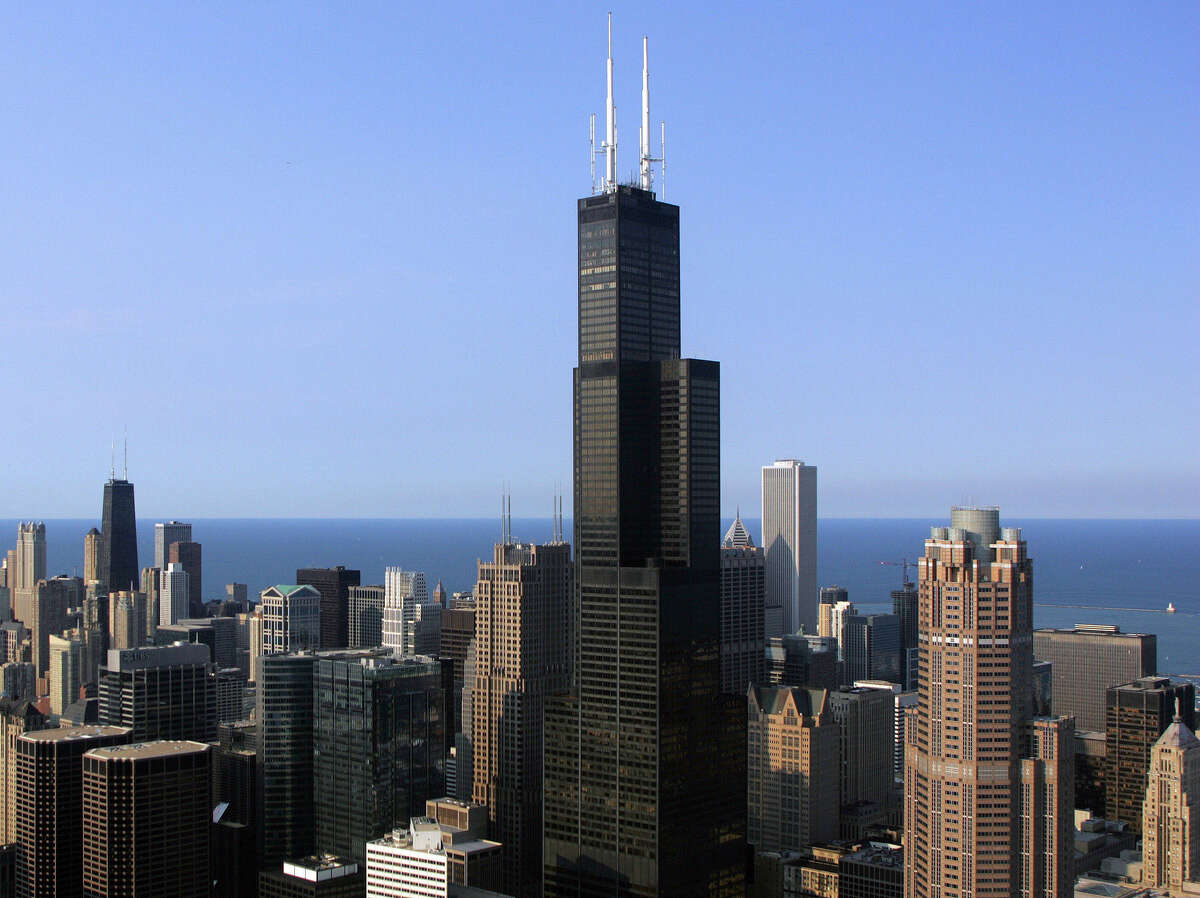 1. Chicago: The Willis Tower, 1,451 feet. Formerly known as the Sears Tower, it was the tallest building in the world until 1996. One World Trade Center is set to surpass it to become the tallest in the country.