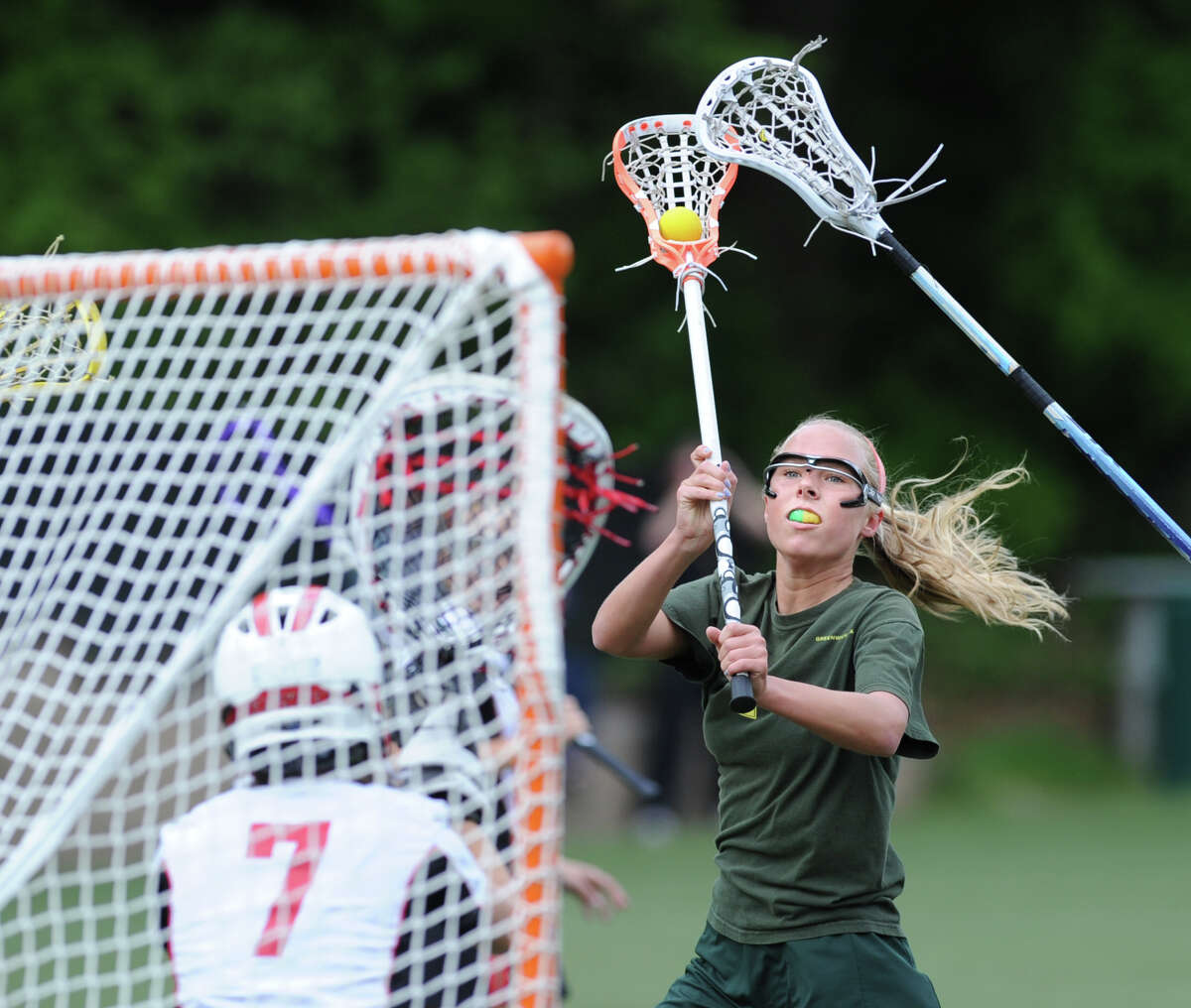 Emily Conway of Greenwich Academy attempts to line up a shot during girls high school lacrosse match between Rye High School and Greenwich Academy at Greenwich Academy, Saturday afternoon, May 5, 2012. Conway missed on her shot attempt as Rye went on to defeat GA, 12-11.