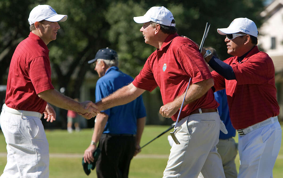 Pat Youngs (center), shown celebrating a match victory in last year’s Rudy’s I-35 Cup, is the reigning city senior champion.