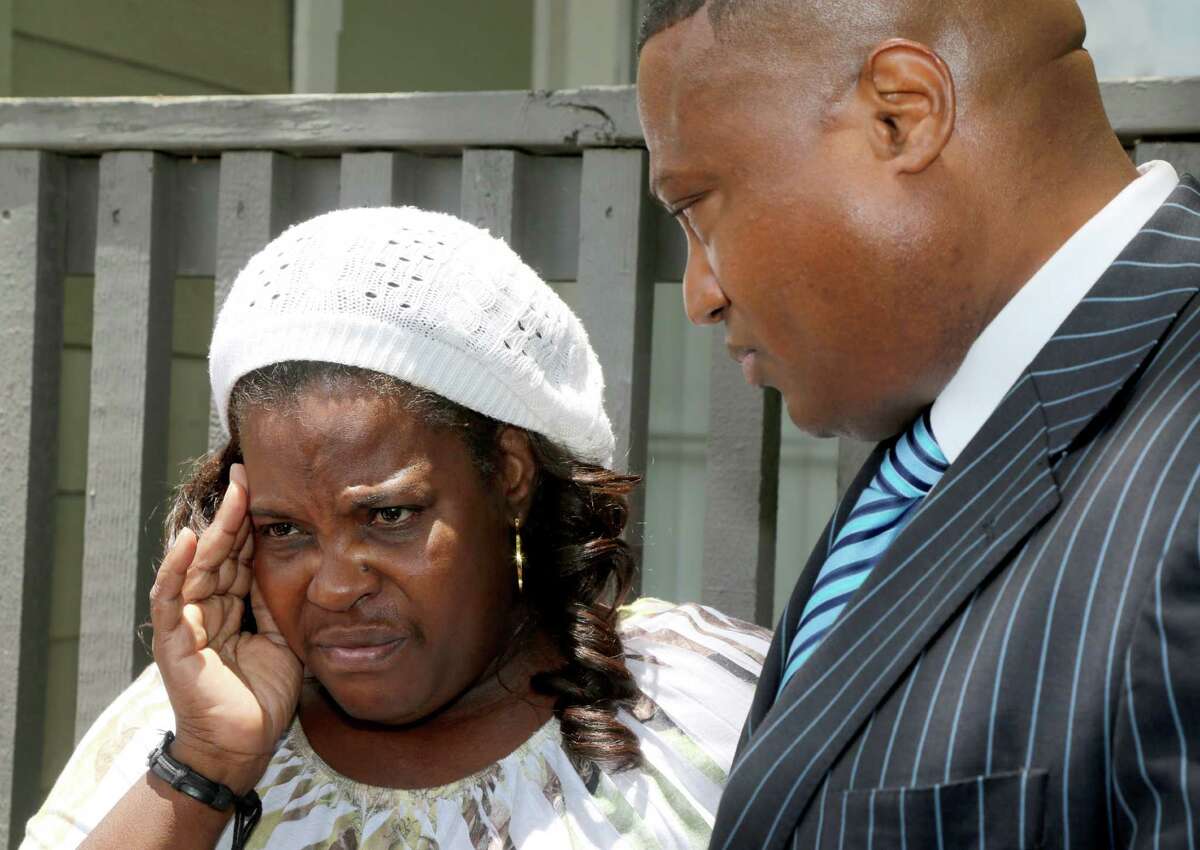 Quanell X, with Chad Holley's mother, Joyce, addressed the media outside her apartment Thursday. He said the teen "has some serious mental health issues."