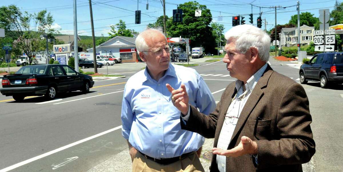 Christopher Shays, a Republican candidate for U.S. Senate, left, and Brookfield Selectman George Walker, discuss the revitilization of Four Corners in Brookfield Friday, June 15, 2012.