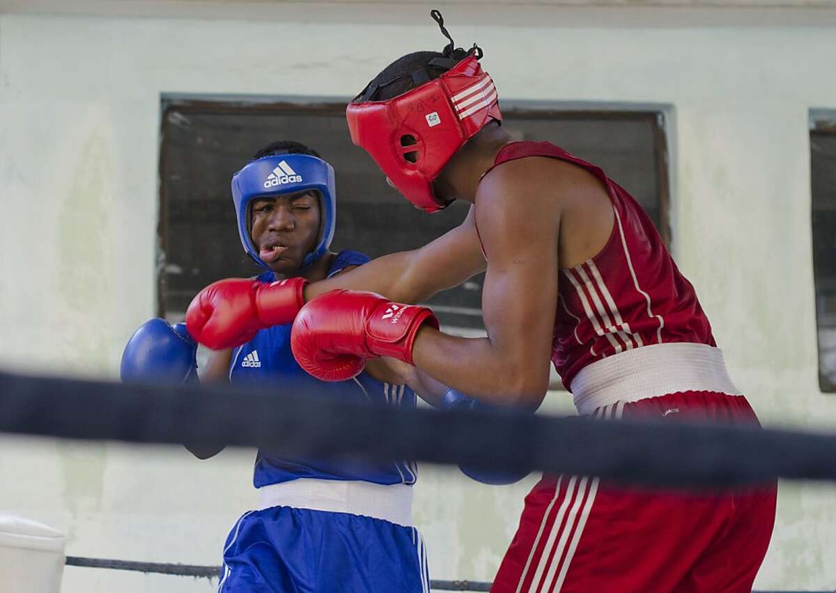 One Cuban boxer connects with another as they compete in the National Championships.