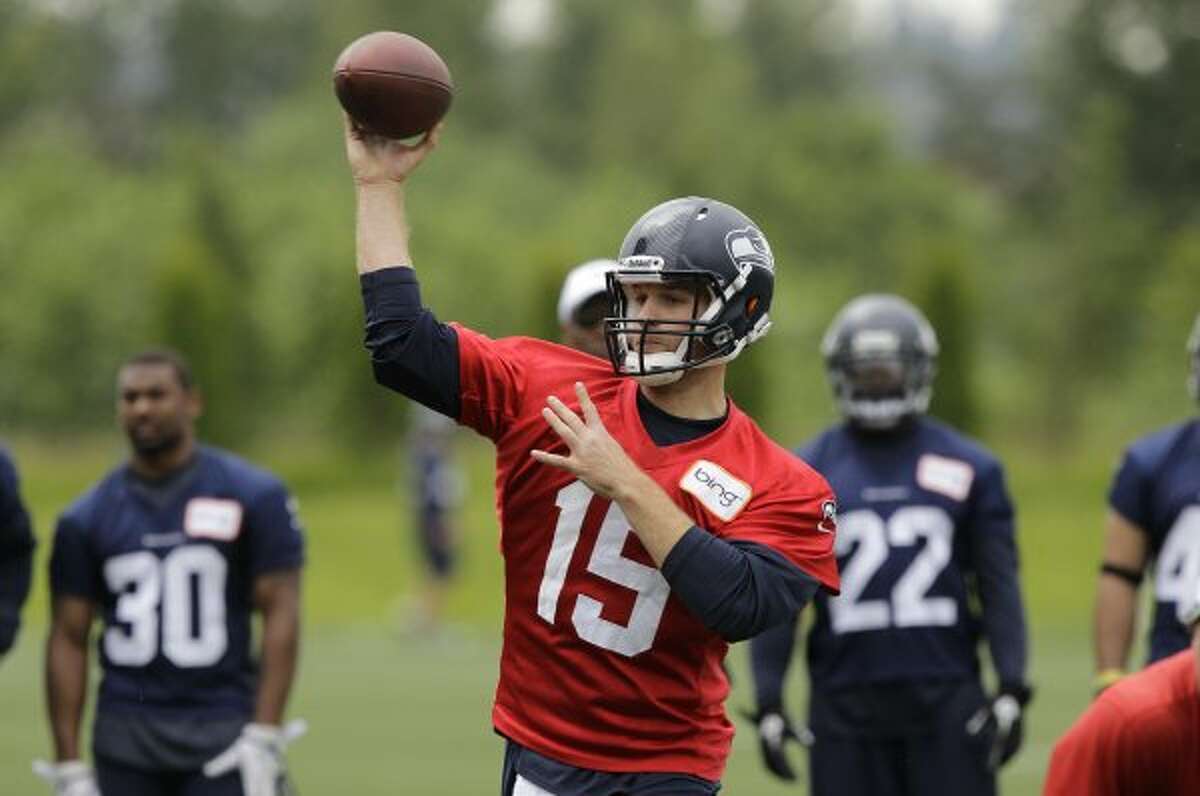 Seattle Seahawks quarterback Matt Flynn throws a pass during practice Thursday, June 14, 2012, in Renton. (Ted S. Warren / Associated Press)