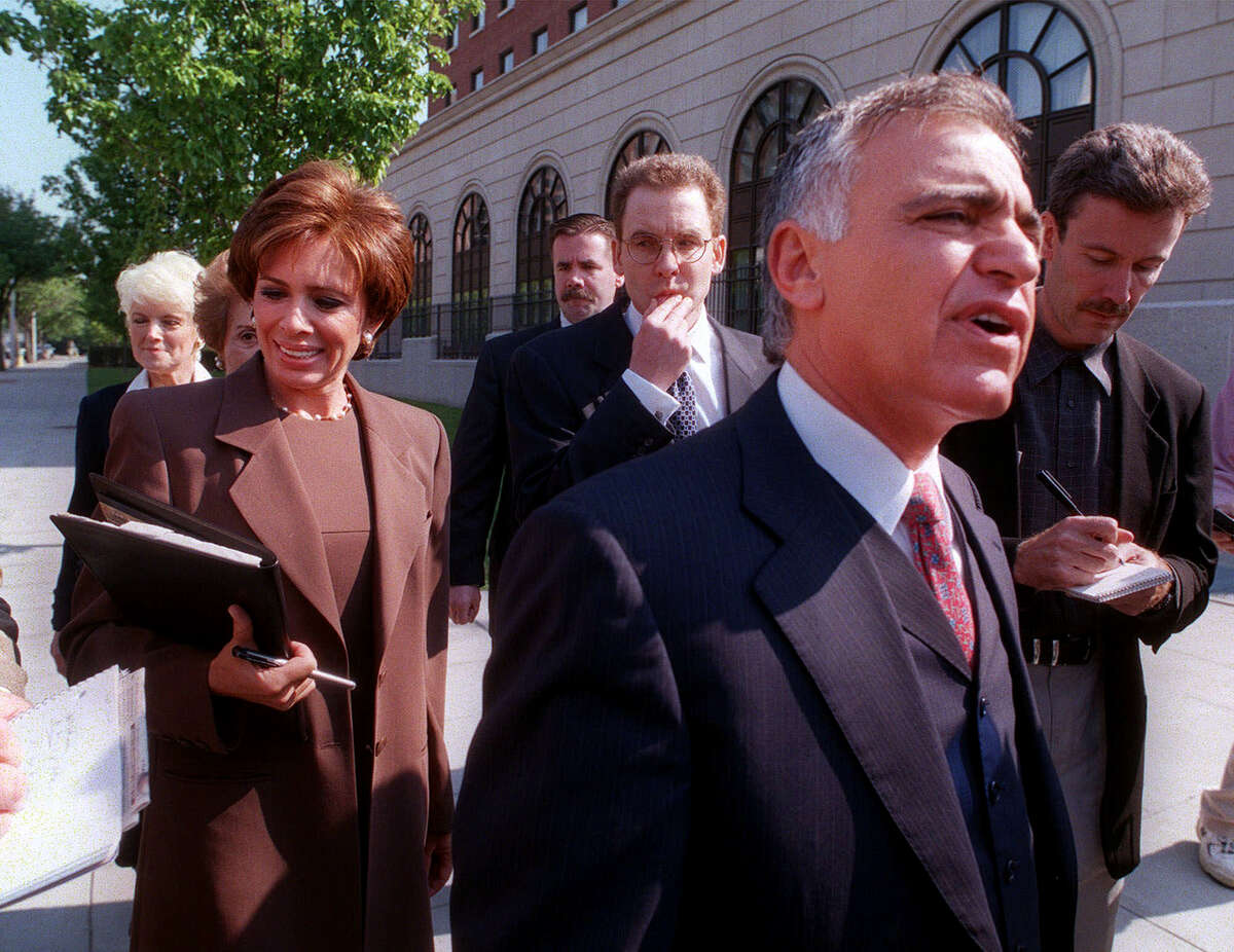 Westchester District Attorney Jeanine Pirro, her husband Albert, foreground, and his legal team arrive at U.S. District Court Wednesday, May 17, 2000, in White Plains, N.Y. Pirro showed up in court, not in her customary role as prosecutor but as the supportive wife of a man accused in a $1 million tax fraud scheme.(AP Photo/Mitch Jacobson)