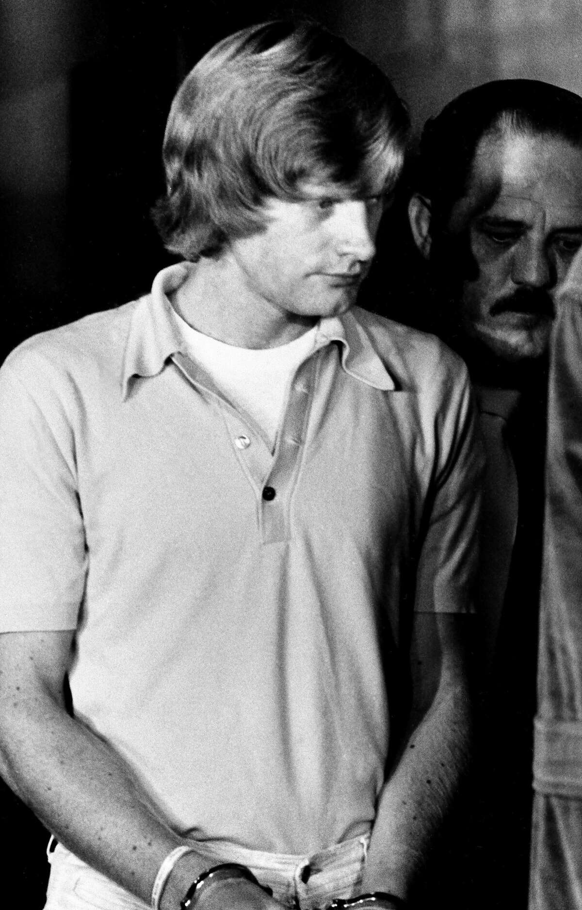FILE - In this July 29, 1976 file photo, Richard Schoenfeld leaves the Alameda County Jail in Oakland, Calif. Schoenfeld, his brother James Schoenfeld and Frederick N. Woods are up for parole again and this time, they have the support of the judge, prosecutors and investigators who handled their notorious case. The trio was convicted of abducting 26 children and their bus driver and hiding them underground in a rock quarry. The victims managed to escape after 36 hours, and none were seriously injured.
