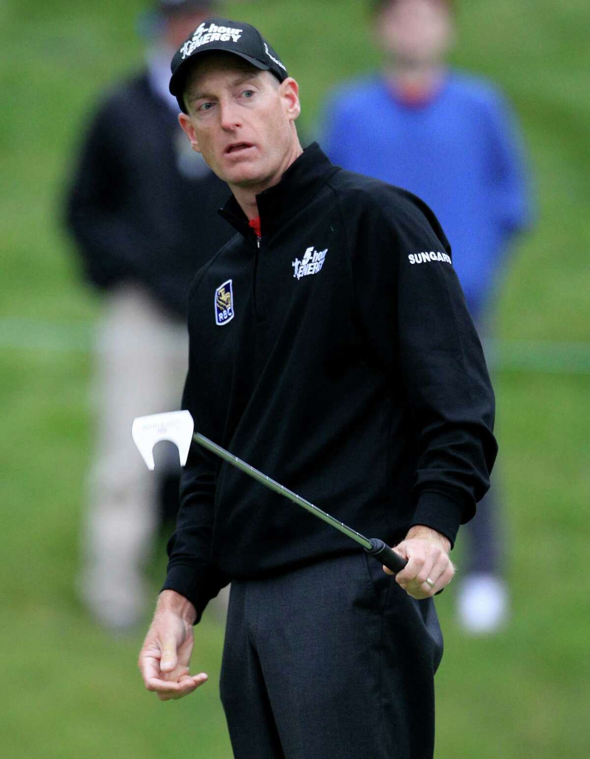 Jim Furyk reacts after missing a birdie putt on the 12th hole during the second round of the Memorial golf tournament at the Muirfield Village Golf Club in Dublin, Ohio, Friday, June 1, 2012. Furyk parred the hole. (AP Photo/Tony Dejak)