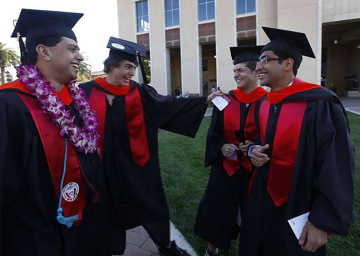 Graduating engineering students (L to R) Sutyen Zalawada, Mike Sizemore, Ross Pimentel and Sandeep Lele share a light moment before commencement exercises for Santa Clara University students in Santa Clara, Calif. on Saturday, June 16, 2012. The group is continuing the research in alternative energy that their associate professor, Dan Strickland, was working on before he died in an auto accident last year.