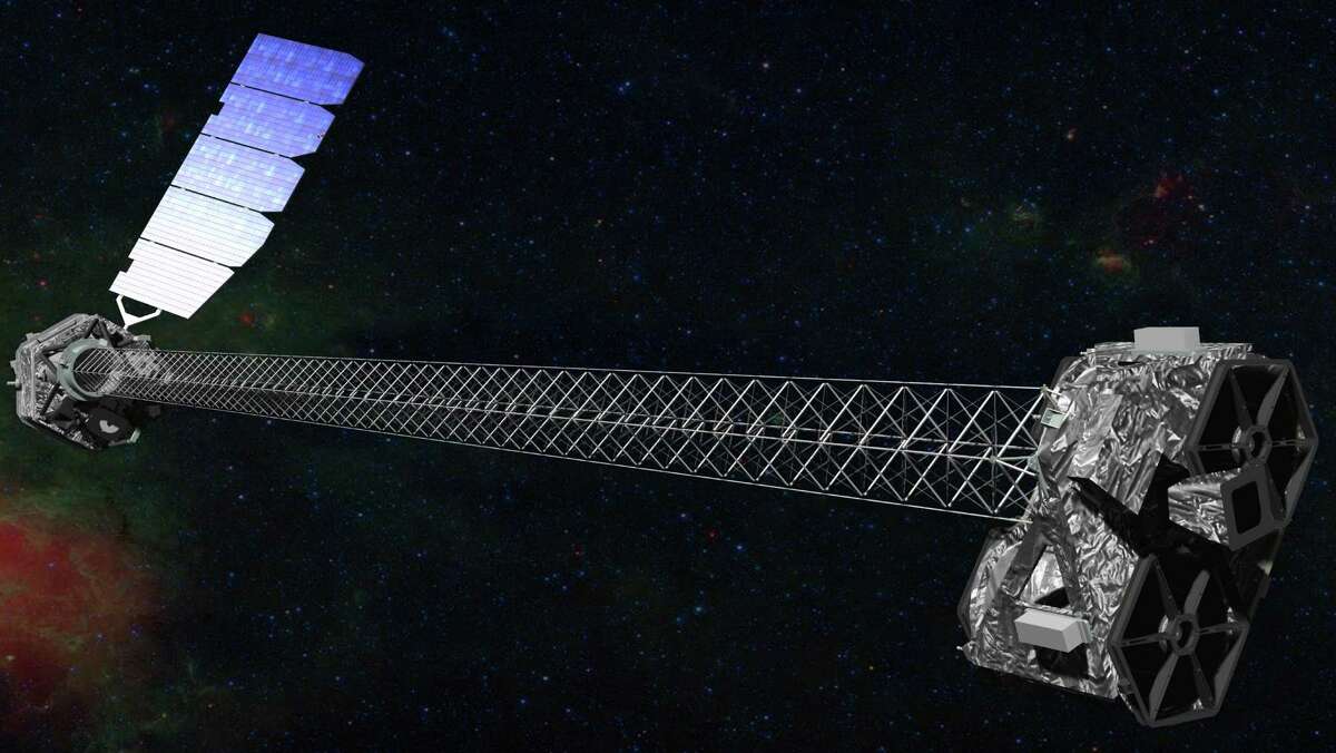 This image provided by NASA shows an artist rendering of the space agency's latest X-ray telescope. NuStar, whose mast is the length of a school bus, launched in June 2012 to study black holes and other celestial objects. NuSTAR stands for Nuclear Spectroscopic Telescope Array. (AP Photo/NASA)