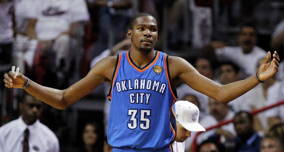 Oklahoma City Thunder small forward Kevin Durant (35) reacts against the Miami Heat during the second half at Game 3 of the NBA Finals basketball series, Sunday, June 17, 2012, in Miami. (AP Photo/Lynne Sladky)
