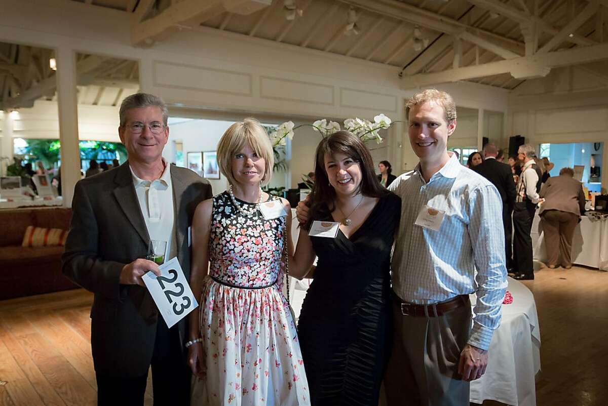 Community Overcoming Relationship Abuse, or CORA, held its annual fundraising gala on May 10, 2012, at the Menlo Circus Club in Atherton. The nonprofit is the sole agency in San Mateo County serving people who are physically, emotionally and mentally abused by their partners, and offers shelters for victims to escape abuse. From left to right: major CORA donors Michael and Sally Mayer, and CORA board member Rosemary Hintz with Greg Hintz.