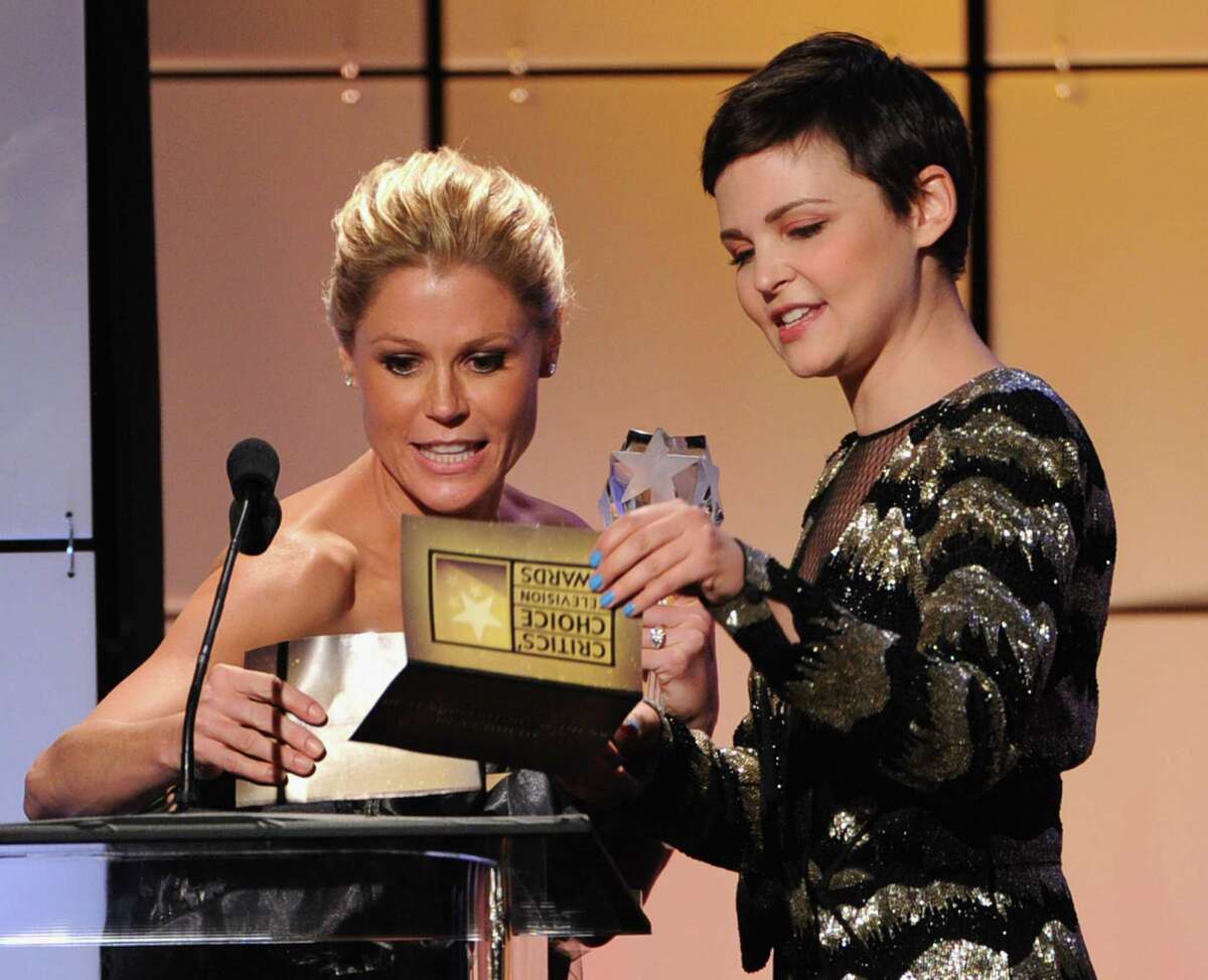 Ginnifer Goodwin (R) presents Julie Bowen with the Best Comedy Actress onstage during The Broadcast Television Journalists Association Second Annual Critics' Choice Awards at The Beverly Hilton Hotel on June 18, 2012 in Beverly Hills, California.