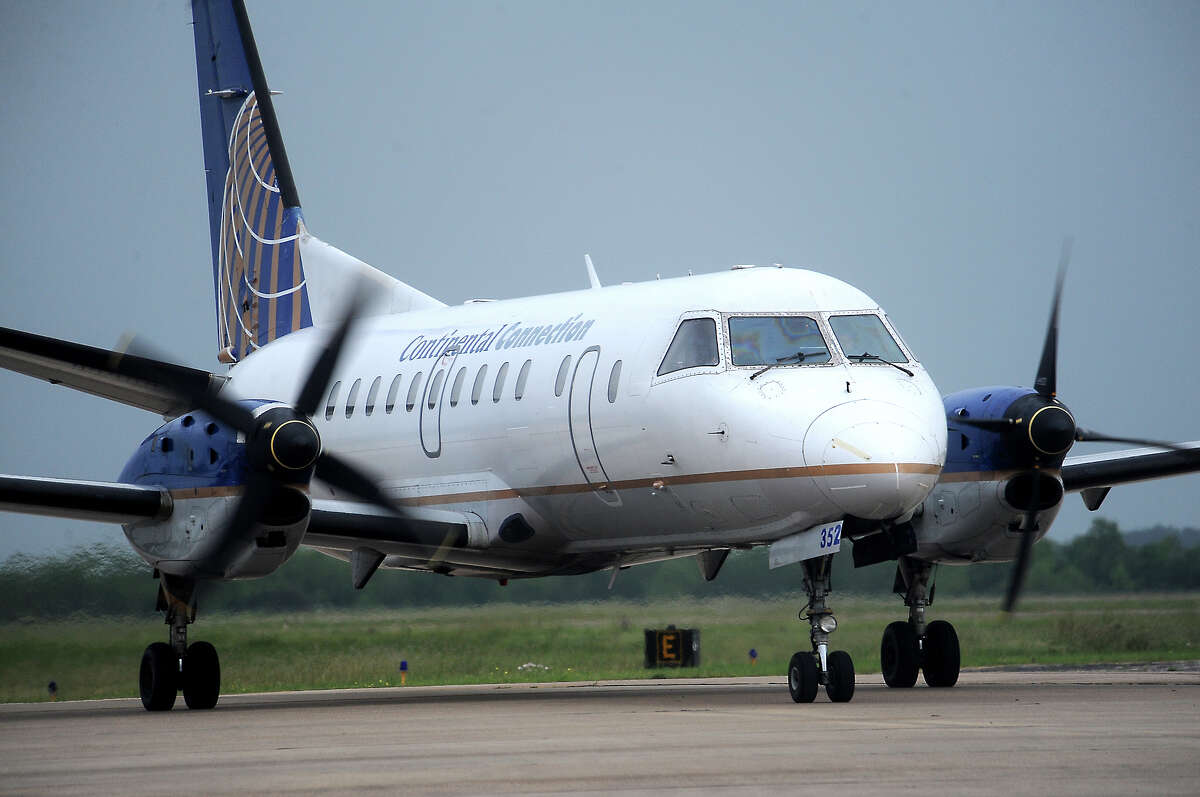 A Continental flight arrives at the Jack Brooks Regional Airport in Beaumont, Wednesday, April 4, 2012. PInnacle Airlines will no longer be providing commuter flights between Jack Brooks and George Bush Incontinental in Houston. Tammy McKinley/The Enterprise