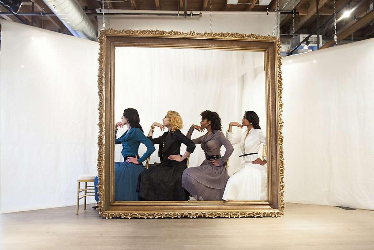 Models pose for a photo during a live re-creation of iconic vintage Dior photos during a fashion show "Dior: A Life in Pictures" presented by The Factory and CODE Salon in San Francisco, Calif. on Thursday, May 24, 2012.