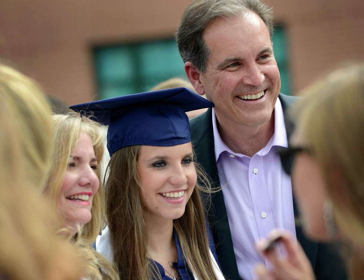 During the after graduation ceremony held in the courtyard at Staples High School, Lorrie and Jim Nantz pose for a photo with their daughter Caroline who just graduated from Staples High School, Westport, CT, on Tuesday June 19th 2012