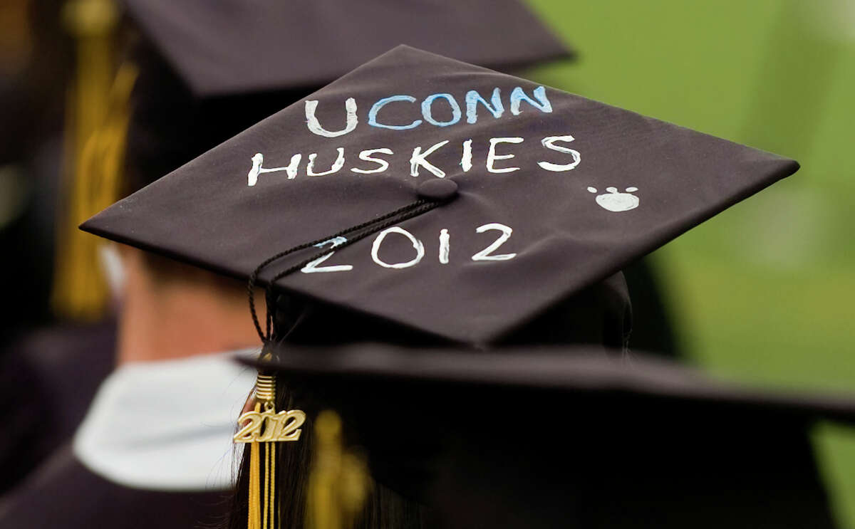 A student declares her intentions for college on her cap, during Trumbull High School's Class of 2012 Commencement Exercises in Trumbull, Conn. on Tuesday June 19, 2012.