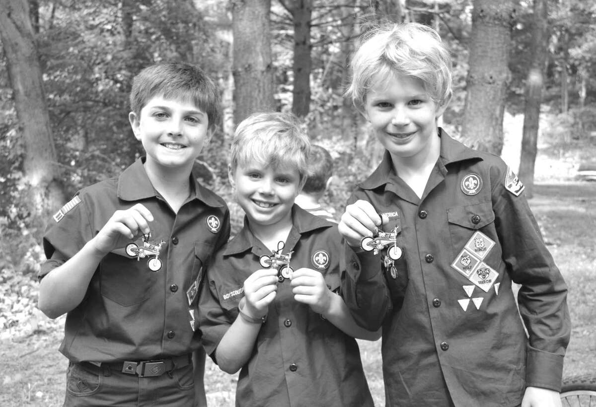 On July 12, Greenwich Scouting celebrates the official Centennial Anniversary of their charter by the Boy Scouts of America. Every event for Scouts has been special this year in honor of the Centennial, including the BMX Cuboree when Cub Scouts raced their bikes. From left to right at the Cuboree are Declan Long, Charlie and Christopher Benincasa, all from Boy Scout Pack 10.