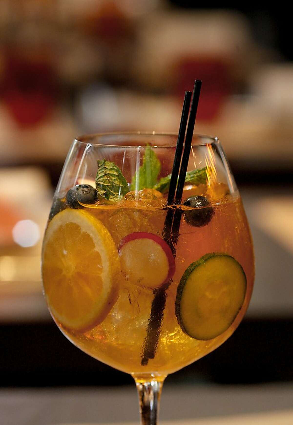 The "Pimms" 74 cocktail features seasonal fruit. RN74 is located in the Millennium tower near Mission and Beale Streets in downtown San Francisco, CA.
