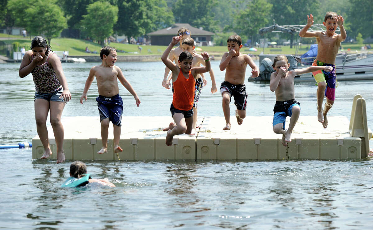 Third-graders from Great Plain Elementary School in Danbury celebrate the last day of school with a beach party at Pleasant Acres, a private community on Candlewood Lake in Danbury Wednesday, June 20, 2012, the first day of summer.
