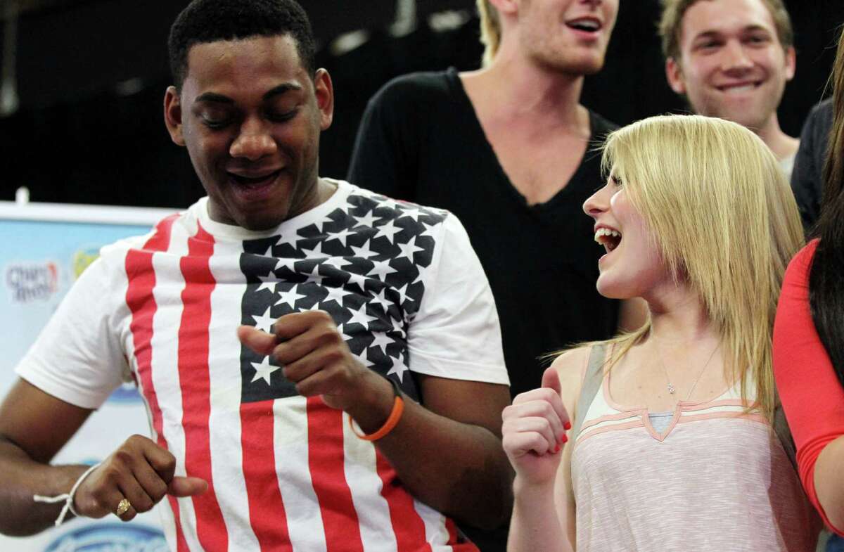 American Idol season 11 contestants Joshua Ledet, left, and Hollie Cavanagh perform at the American Idol Live! Tour press junket on Wednesday, June 20, 2012 in Los Angeles. (Photo by Matt Sayles/Invision/AP)