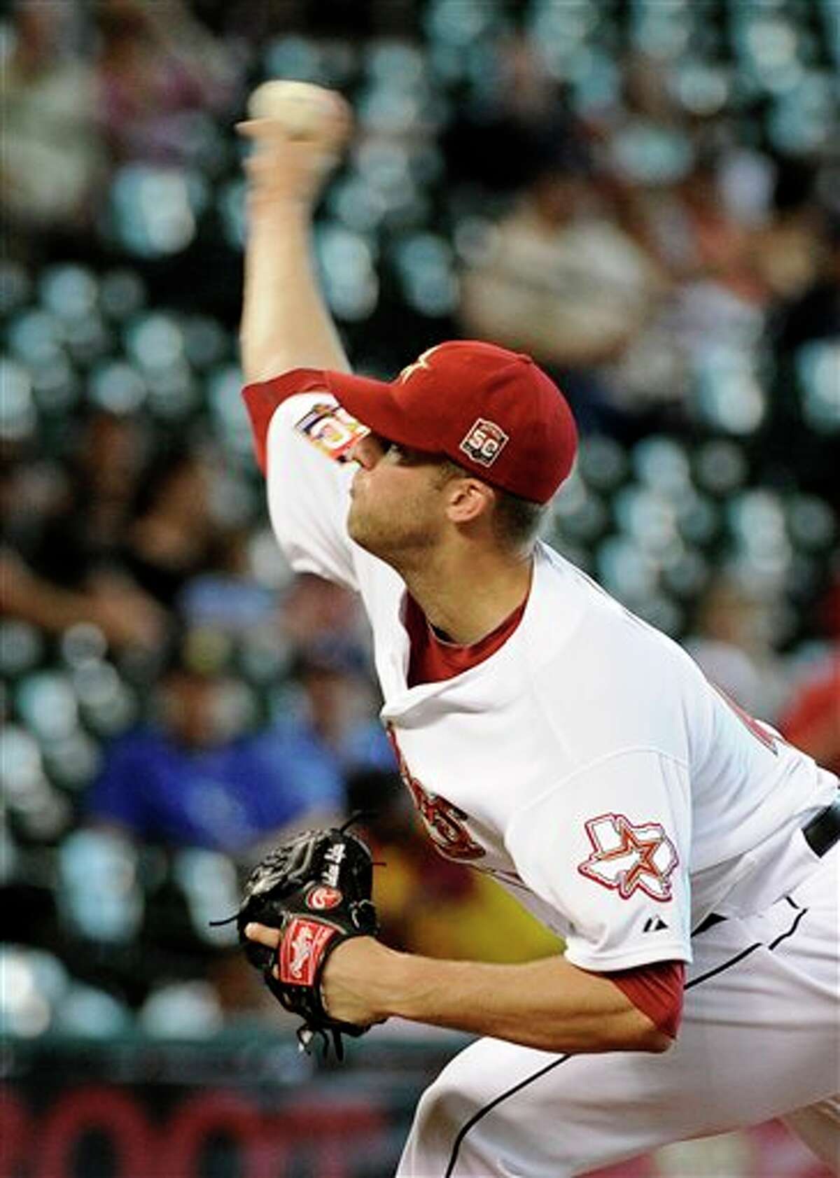 Houston Astros' Jordan Lyles delivers a pitch against the Kansas City Royals in the second inning of a baseball game Wednesday, June 20, 2012, in Houston. (AP Photo/Pat Sullivan)