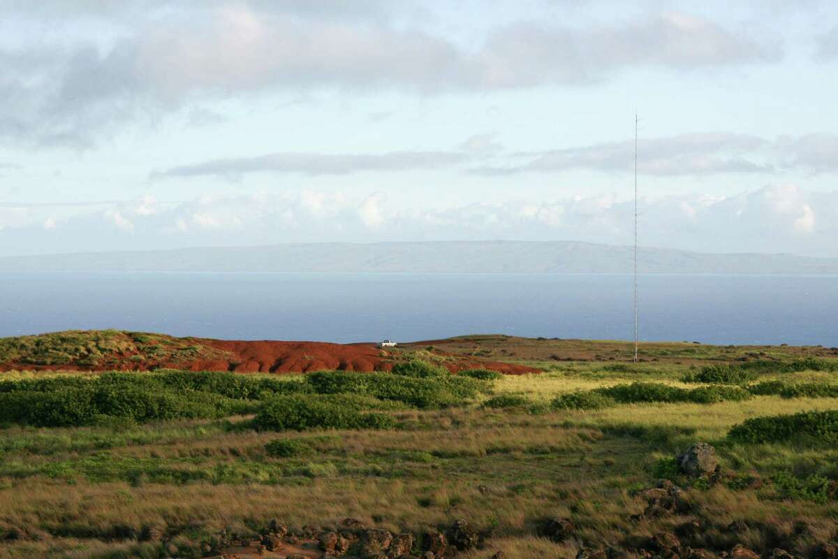 A meteorological tower stands on the island of Lanai, Hawaii, U.S., on Aug. 6, 2008. Billionaire David Murdock turned Lanai Island into a tourist destination, said Waynette Kwon, director of the Lanai Visitors Bureau. Lanai was mostly pineapple plantations and one 11-room hotel before Murdock's 1985 purchase of Castle & Cooke Inc., which owns 98 percent of the island. Now the aesthetics of a proposed $750 million power project that would erect 200 windmills next to Polihua Beach trouble some visitors and residents. Photographer: Robin Kaye via Bloomberg News EDITOR'S NOTE: NO SALES. EDITORIAL USE ONLY.