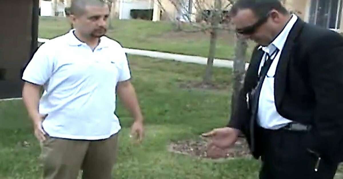 In this Feb. 27, 2012 image taken from a Sanford Police video posted on a website called gzlegalcase.com by George Zimmerman's defense team, Zimmerman speaks to an unidentifed investigator at the scene of Trayvon Martin's fatal shooting a day later giving police a blow-by-blow account of his fight with the teen. On the tape, Zimmerman did a reenactment of the scuffle with Martin in the moments before he shot the 17-year-old from Miami. (AP Photo/Sanford Police video via Zimmerman Defense Team)
