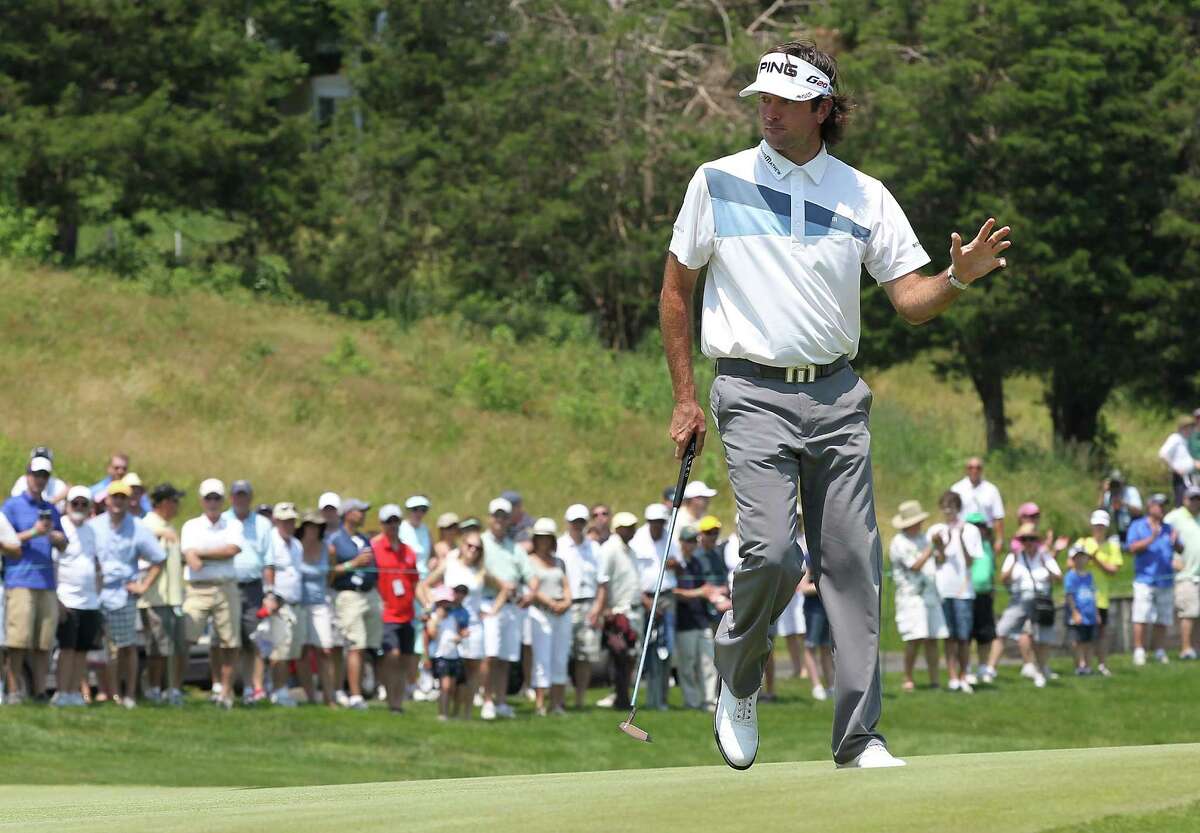 CROMWELL, CT - JUNE 21: Bubba Watson reacts on the 1st green during Round One of the 2012 Travelers Championship at TPC River Highlands on June 21, 2012 in Cromwell, Connecticut. (Photo by Jim Rogash/Getty Images)