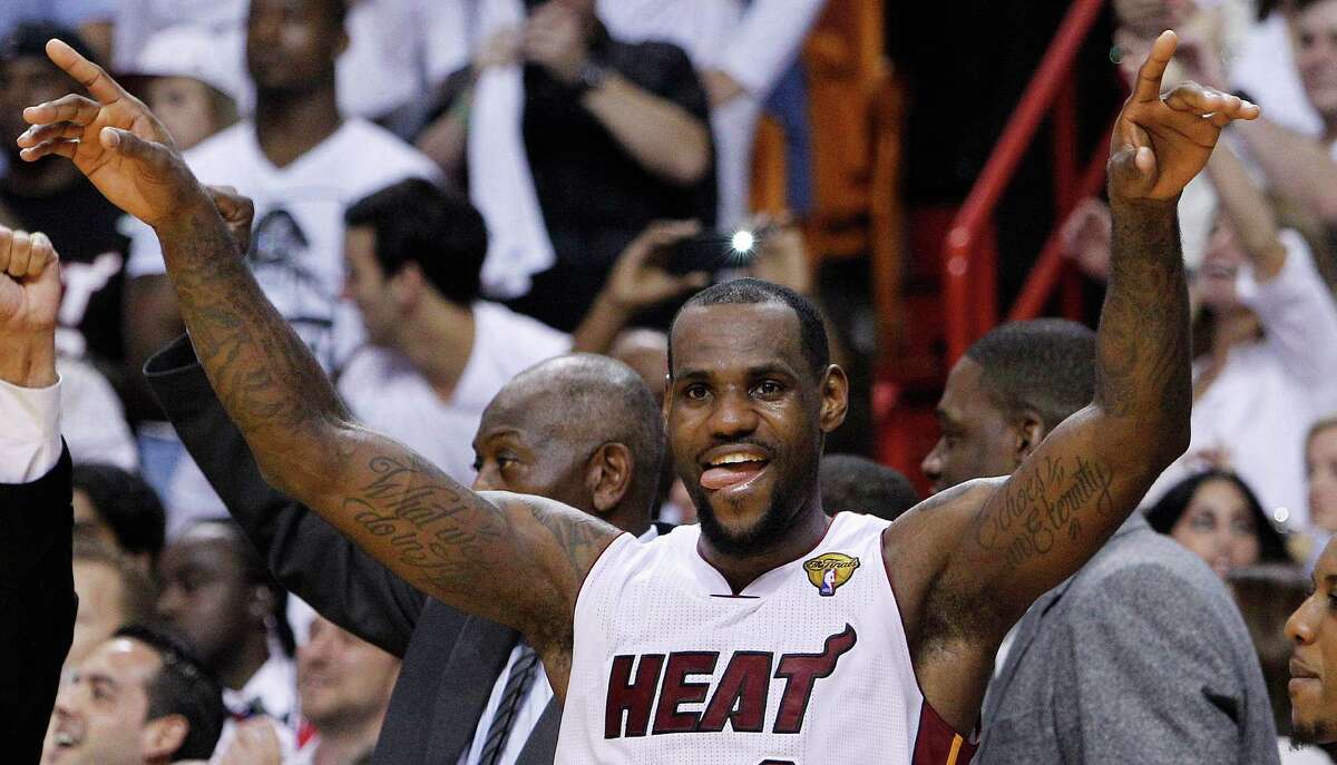 Miami Heat small forward LeBron James (6) reacts in the final moments during the second half at Game 5 of the NBA finals basketball series, Thursday, June 21, 2012, in Miami. The Heat won 121-106 to become the 2012 NBA Champions.(AP Photo/Lynne Sladky)