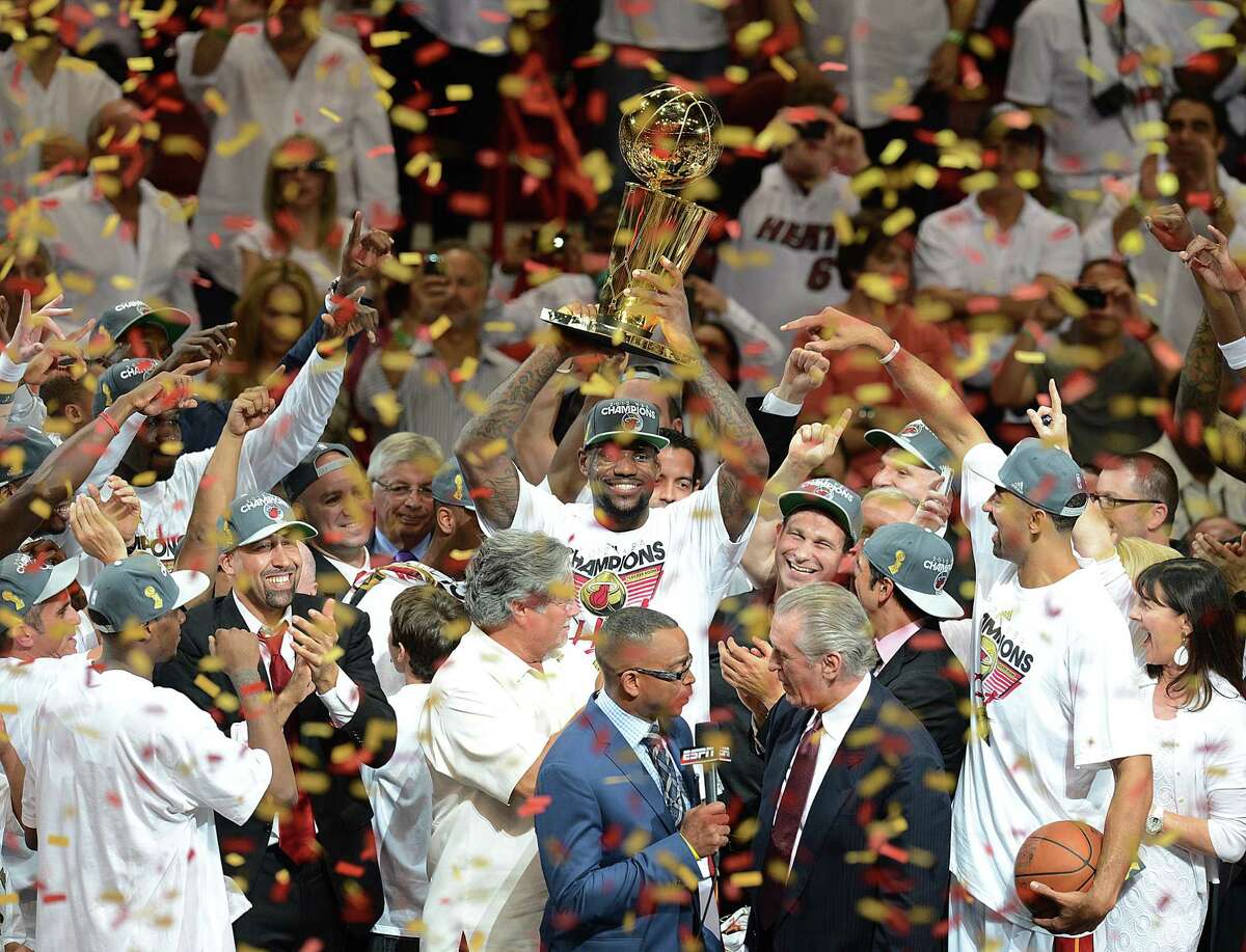 Dwyane Wade & Lebron James w/ 2012 NBA Champs Trophies