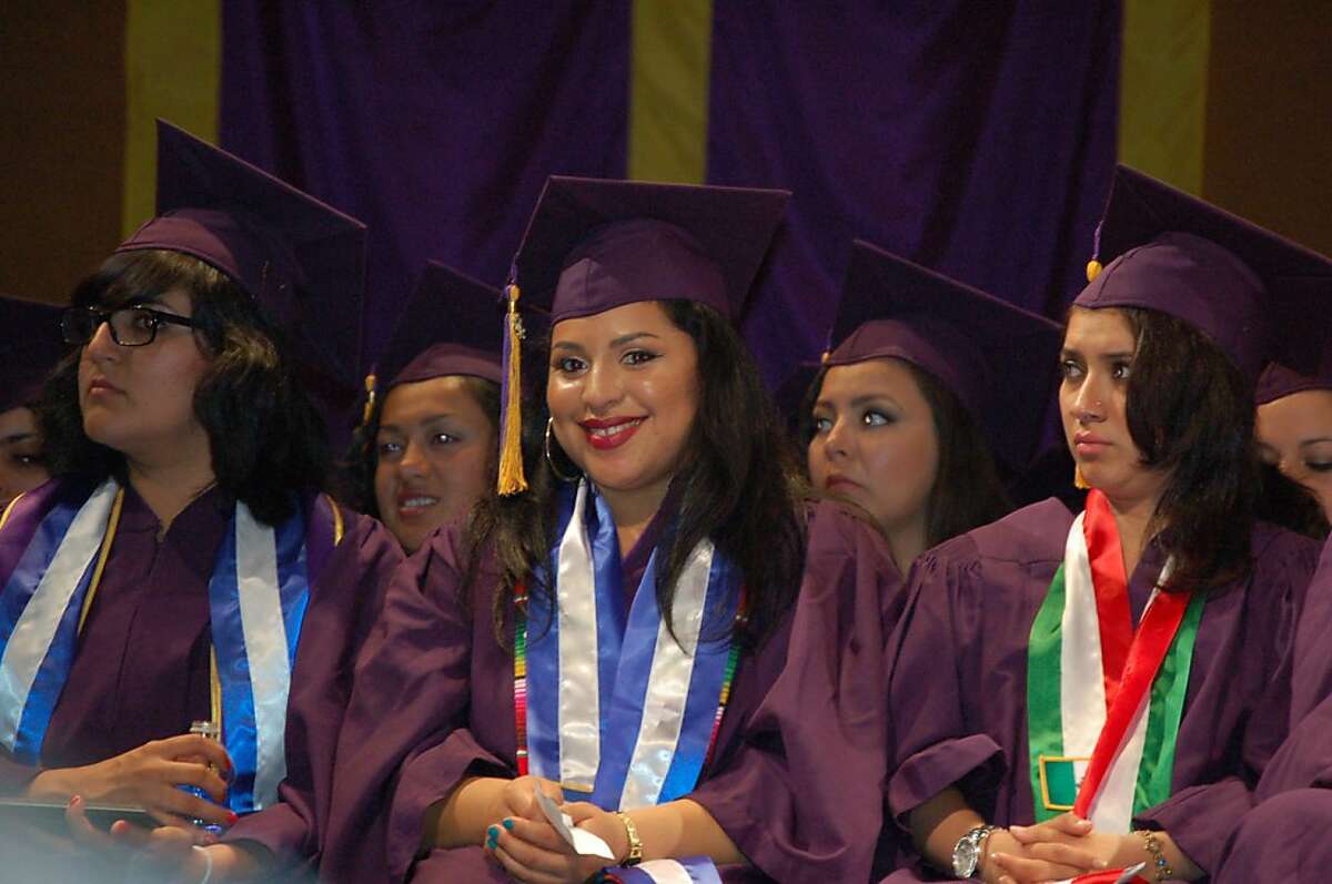 Sammie Ramirez (center) is seen during her graduation ceremony in the McKenna Theatre at San Francisco State University on Saturday, May 12, 2012 in San Francisco, Calif.
