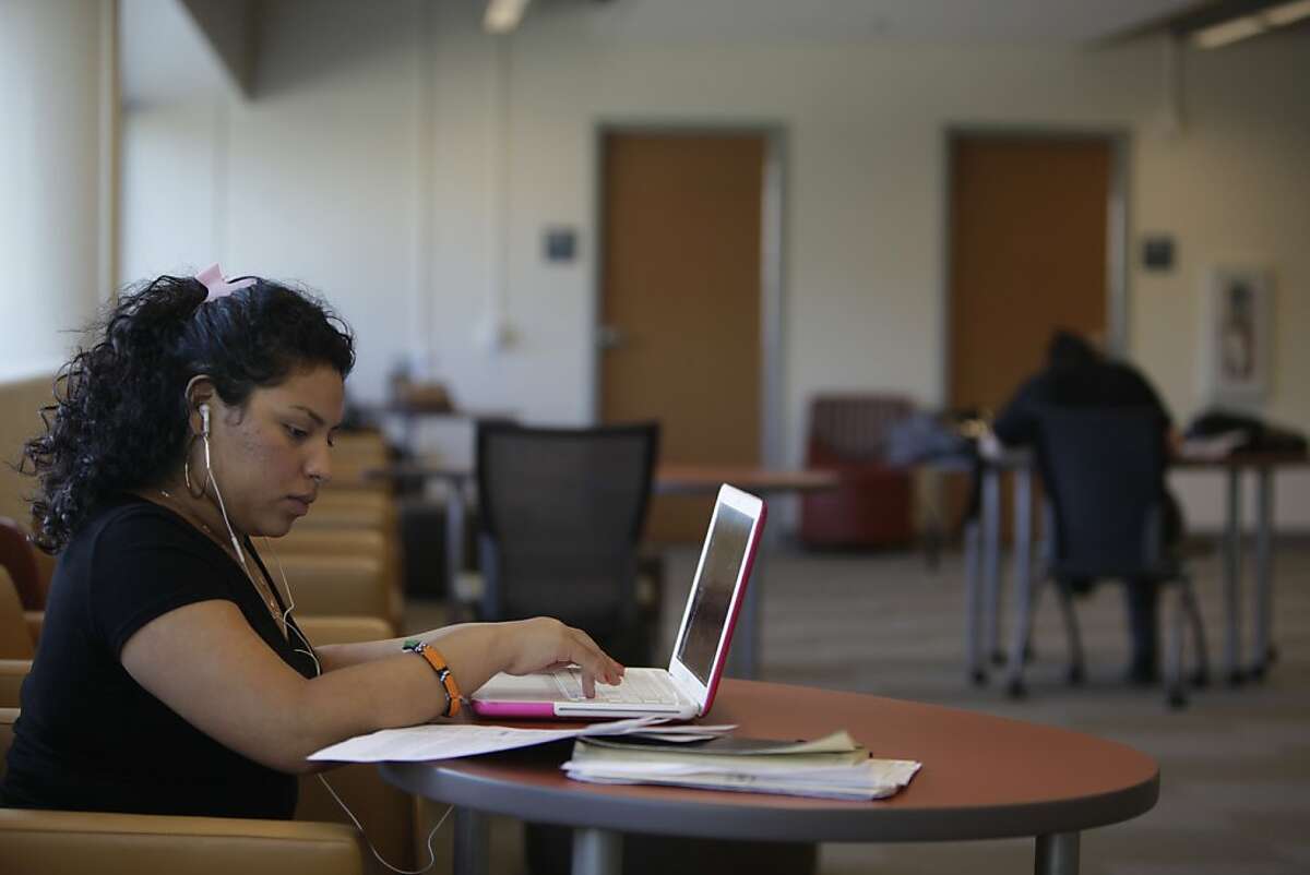 San Francisco State University graduate Sammie Ramirez works on her resume at the J. Paul Leonard library at San Francisco State University on Thursday, June 14, 2012 in San Francisco, Calif.