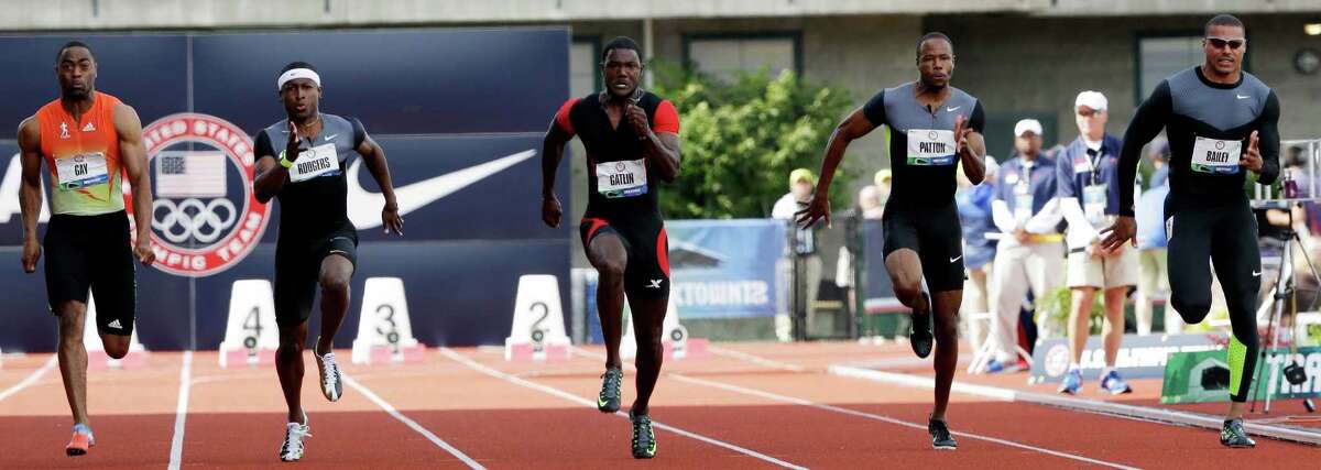 Tyson Gay, Michael Rodgers, Justin Gatlin, Darvis Patton and Ryan Bailey participate in the men's 100m finals at the U.S. Olympic Track and Field Trials Sunday, June 24, 2012, in Eugene, Ore. (AP Photo/Eric Gay)
