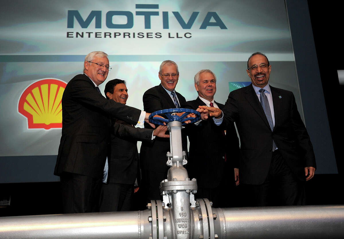 Replacing the traditional ribbon cutting, officials turn a symbolic valve to signal the opening of Motiva's Crude Expansion Project in Port Arthur on Thursday. Photo taken Thursday, May 31, 2012 Guiseppe Barranco/The Enterprise